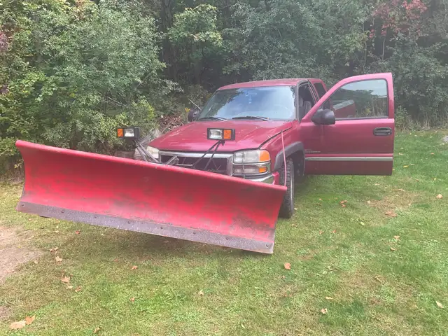 2005 seirra 4x4 with western 8 foot plow power angle