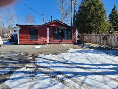 Double corner lot with services. Double driveway, with bungalow style home with attached garage. The...