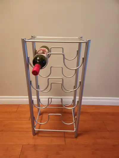 Metal table with glass top with wine storage underneath, View more