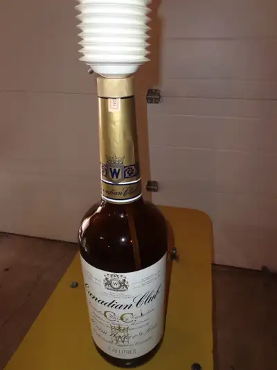 1963 Canadian Club Texas Mickey with Pump. Asking $15