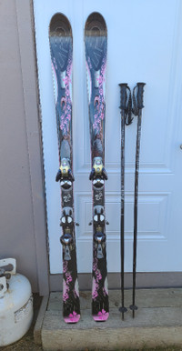 K2 160cm skis with Salomon bindings and poles