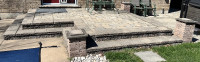 Back porch  made of concrete blocks plus Pergola stones