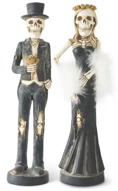 "RESIN SKELETON LADY and MAN TAPER CANDLESTICKS stand 14" H. Quality inspected. NOTE: Candles sold s...