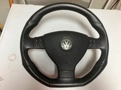 Flat bottom steering wheel & airbag for a MK5 golf/jetta DSG, In good shape, there are 2 wear/scratc...