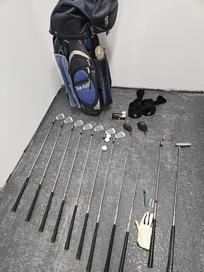 This is a used Top Flite golf club set, perfect for anyone looking to get into the game. The set inc...