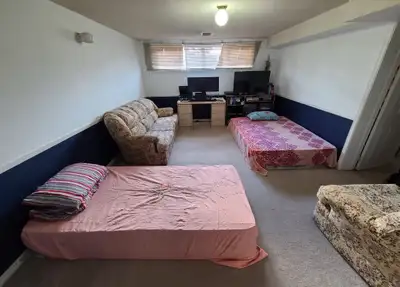 *You will be sharing the room with one other female .* Room in basement available at Jane and Wilson...