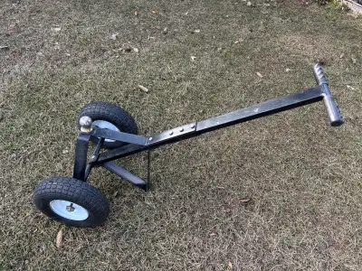 600 lb trailer dolly with 2” ball. Works great for tight places.