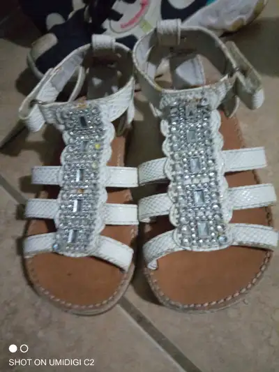 These Adorable Toddler Sandles Have Diamonds On Them and Velcro straps.They Fit 2T-3T. They are to c...
