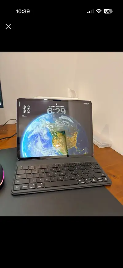 iPad air 13inch with M2 chip Perfect condition Great for study and light Office work Selling with Ap...