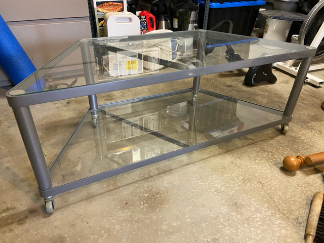 Glass table with wheels - $40 in TV Tables & Entertainment Units in Calgary - Image 2