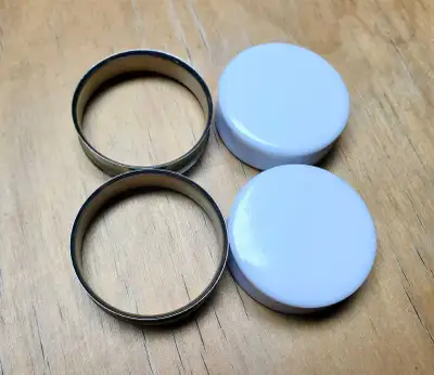 Two new pairs of 38mm plugs / tunnels for stretched ears. One pair acrylic, one pair stainless steel...