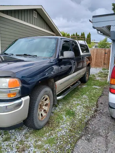 2005 gmc sierra extended cab blue with white canopy automatic 5.3 motor 4x4 297000km runs good some...
