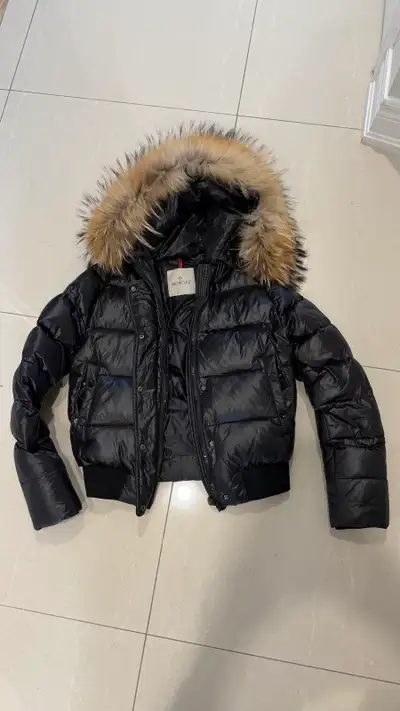 Moncler woman jacket with fur hood. Size 3. Looking for $750 but willing to take a reasonable offer.