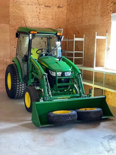 Like new Only 200 hours AC Heat Stereo Hydrostatic Transmission Extra wheels Ballast in rears 320R L...