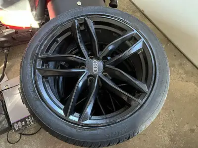 Selling four 245/40-18 winter tires on beautiful 18x8 inch aluminum rims. I had them on my Audi S5 l...