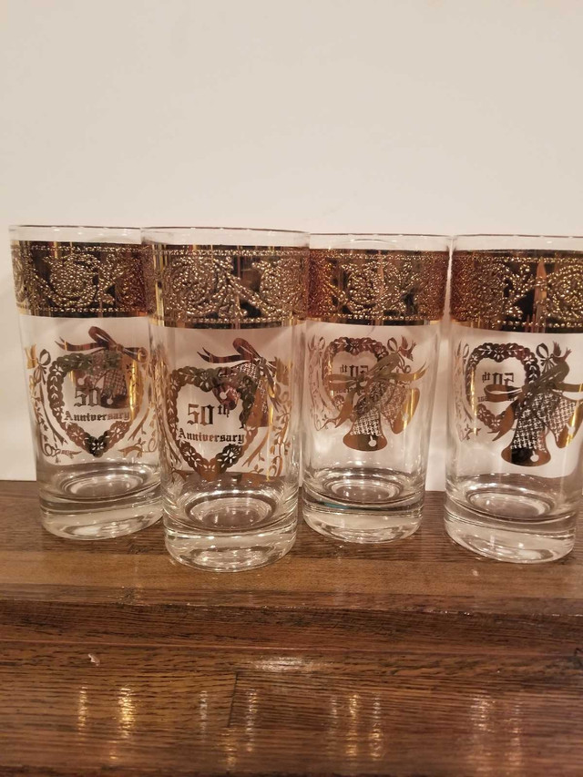 4 gold rimmed 50th anniversary tumblers in Home Décor & Accents in Oakville / Halton Region