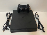 PS4 console + controller + cables