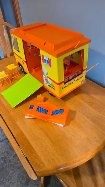Barbie camper van in very good condition with 2 chairs and pool mattress