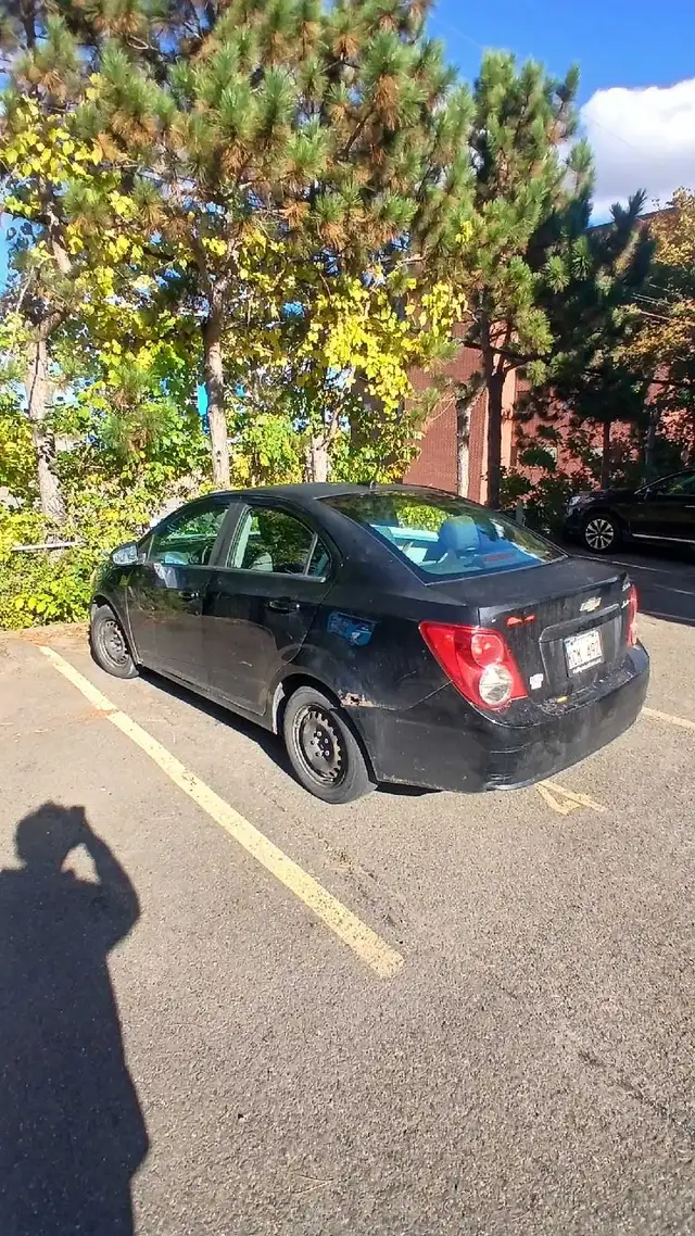 2013 Chevrolet Sonic sedan (1.8L 4-cylinder, 5-speed manual)