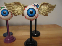 flying eyeball custom figure stand Von Dutch