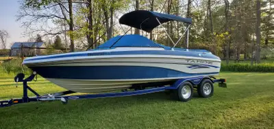 For sale Tahoe Q6 Boat, 20FT Long with 4.3 L inboard Mercruiser engine. Comes with orginal Dual Axle...