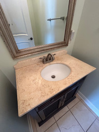 32” cabinet with sink taps and mirror