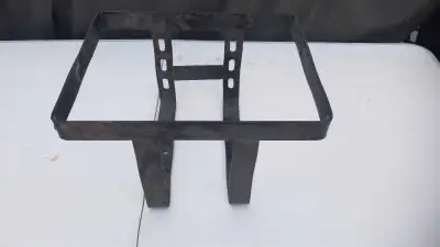 This is a used motorcycle carrier, ready for your next project. Perfect for hauling a spare gas can...