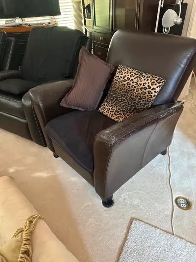 Two Leather recliners, View more