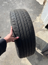 All season tire with rim