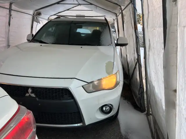 Automatic 4WD 2.4L Quebec inspection or EXPORT64959945369986122