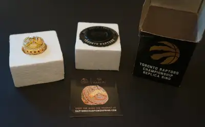 Ring, Mount and Original Box NORTH written on the top with Toronto building structures On the sides...