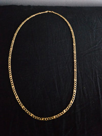 10kt italian gold figaro chain.. 6 grams and 22 inches long
