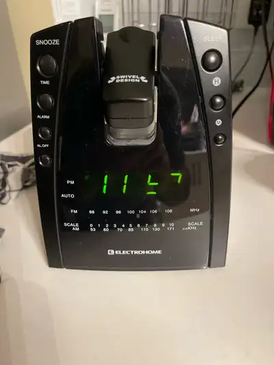Alarm clock radio with ceiling projection.  , View more