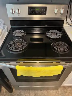 Frigidaire SS stove and white fridge for sale, View more