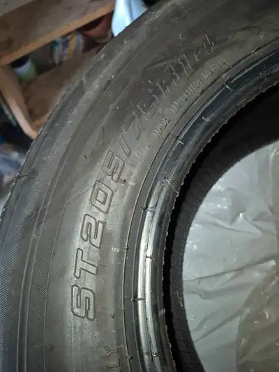 Used like new. Trailer tires st205 75 14 roughly 1200km on them. Price is firm for all 5