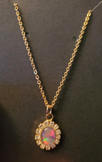 Vintage pendant necklace.  October birthstone with crystals.