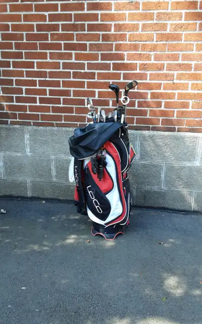Set includes: Dunlop bag Woods 1-3 Irons 2-3-5-6-7-8-9-Pitching wedge--Putter Balls (many)--Tees--Ba...