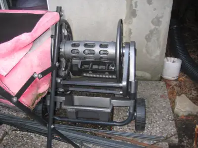 FS: garden hose reeler/storage, bike wheel with tire etc., View more