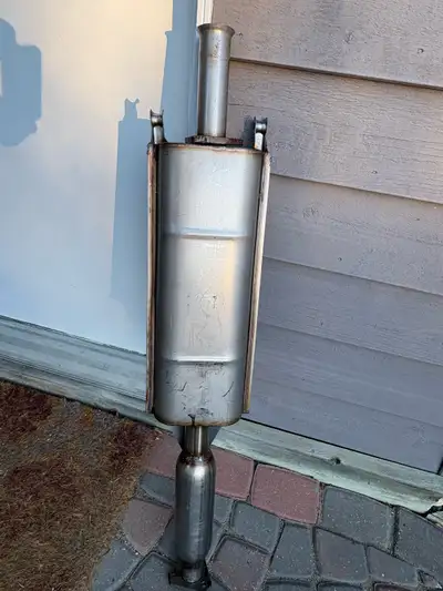 NOS Stainless Steel Heavy Duty Bombardier Iltis Muffler. Supplied with 2 NOS Steel Exhaust Donuts.