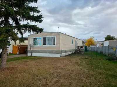 3 bedroom one bath double wide clean mobile home. Llaminate flooring throughout with stove and fridg...
