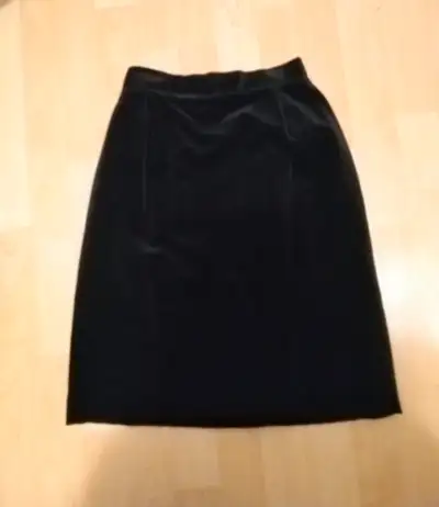 Black Velvet Slim Skirt, fully lined With back kick pleat. 100% cotton Half back elastic and front f...