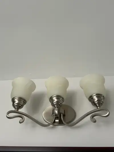 TWO BRUSHED NICKEL VANITY LIGHTS, View more