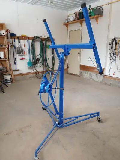 11 foot drywall hoist with tilting action. Capacity 150 lbs. Just like new.