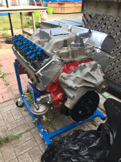 Weiand Aluminum intake $60 Single plane Windage tray $100 Diamond stripped model new. Braided hose d...