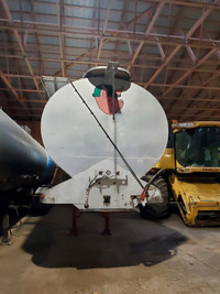 Feed auger trailer