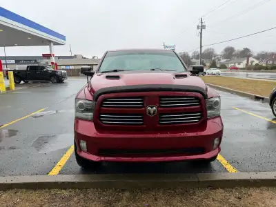 Selling my 2014 ram sport has 3 inch lift from rough country 20 inch rims with 35 x 12.5 tires upgra...
