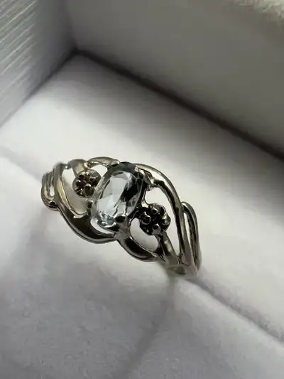 10 k aquamarine and 2 diamonds ring, View more