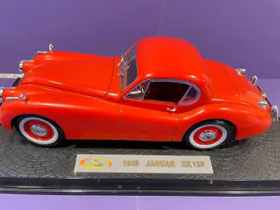 This metal and plastic scale miniature collectible is mounted on its removable, labelled plinth but...