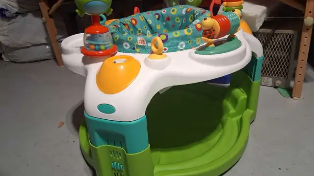 Evenflo centre d'activités pour bébé  in Playpens, Swings & Saucers in Laval / North Shore - Image 2