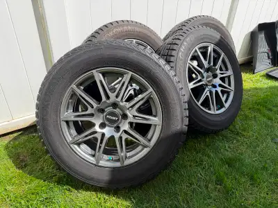These 17-inch Fast wheels paired with Yokohama iceGUARD iG51 tires (235/65R17) are ready to tackle t...